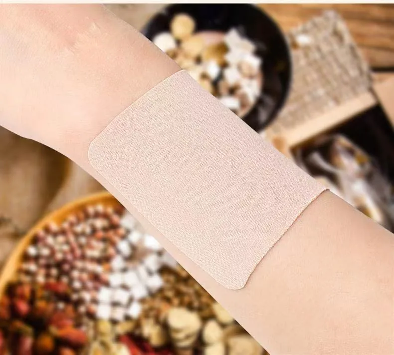 Herbal patch applied near the wrist for flexible placement reference